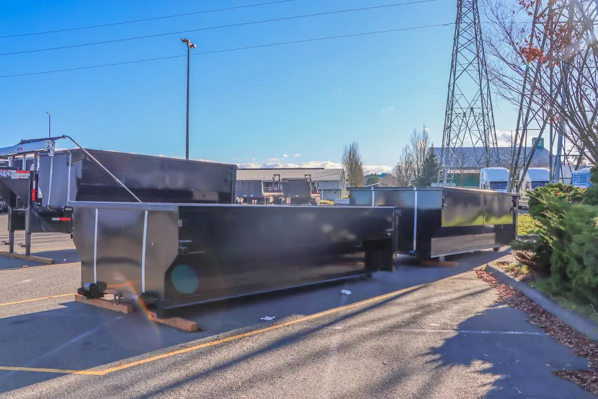 Roll-off dumpster ready for waste disposal at job site for Construction Dumpster Rental in Picayune